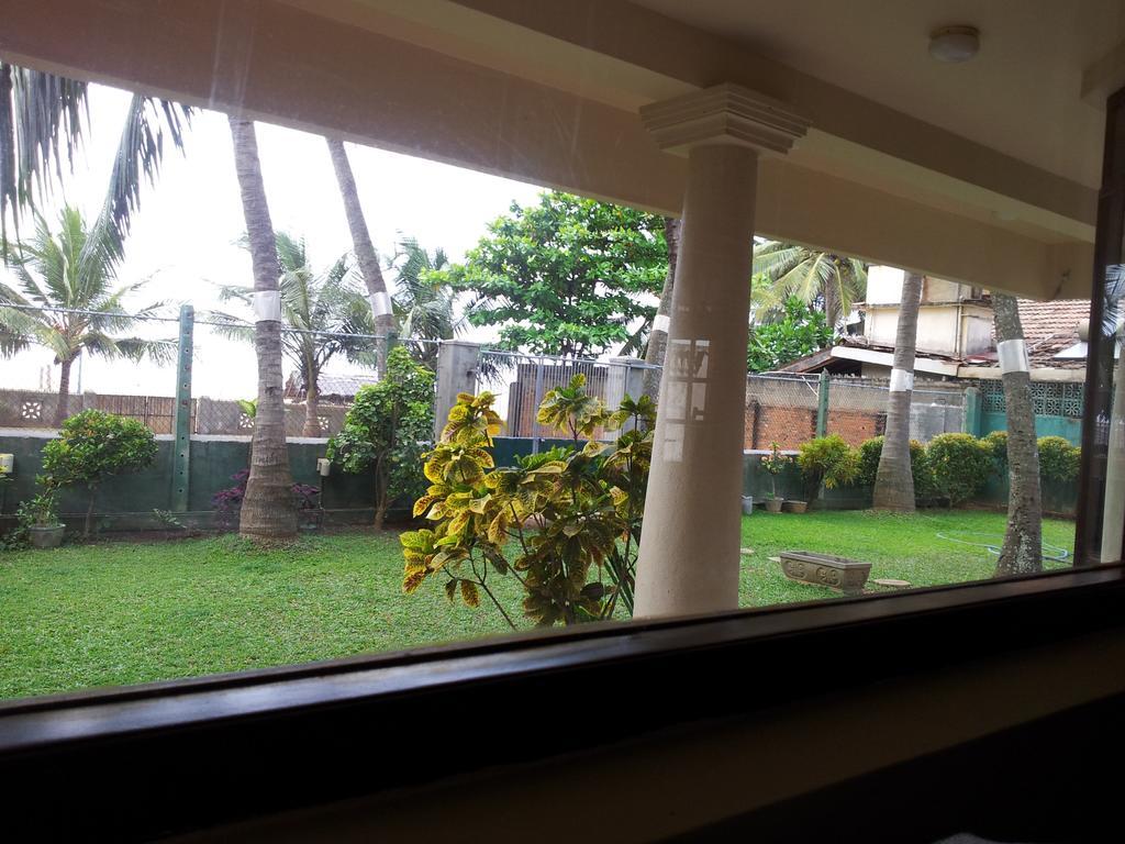 Janishi Residencies Hotell Negombo Rom bilde